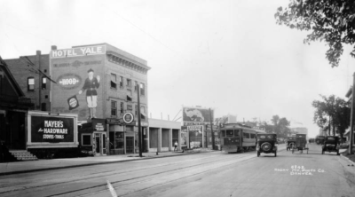 A streetcar shares Broadway with cars and a horse-drawn carriage between 1915 and 1925. Photo: Western History/Genealogy Dept., Denver Public Library