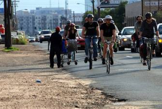 Instead of having to bike in traffic on Brighton Boulevard, soon you'll be able to ride in a great bike lane, thanks in part to BikeDenver. Photo: BikeDenver