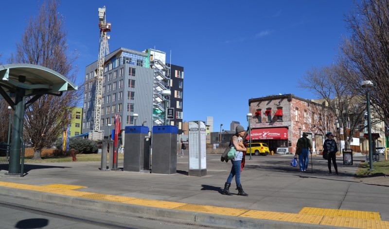 Dense development around around the 10th and Osage RTD station includes homes and ground-floor businesses within walking distance of a grocery store, bike-share, a park, a student community center, and the Santa Fe Arts District. Photo: David Sachs