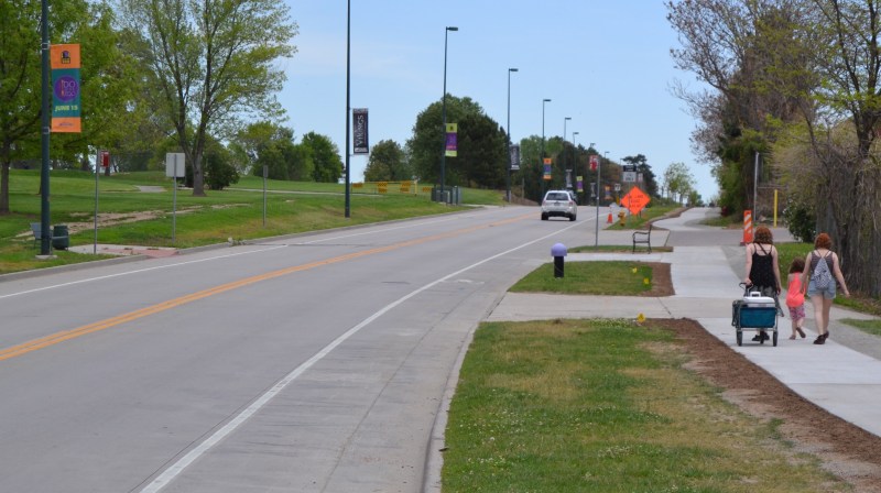 East 23rd Avenue has a fresh sidewalk on one side, but none on the other. Photo: David Sachs