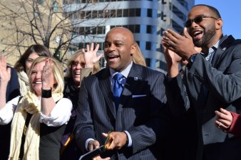 Mayor Michael Hancock cuts the ribbon on the Arapahoe Street protected bike lane in 2015. Photo: David Sachs