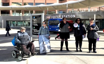 9to5 Colorado transit organizer Jenee Donelson rallies a crowd at Civic Center Station on Monday morning. Photo: David Sachs