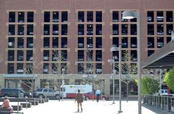 A parking lot across the street from Union Station, Denver's central transit hub, isn't exactly screaming for people not to drive. Photo: David Sachs