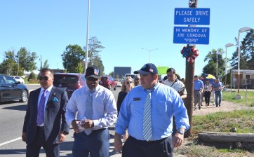 Mayor Michael Hancock, center, walks alongside Adams County Commissioner Steve O'Dorisio, right, on Federal Boulevard. Photo: David Sachs