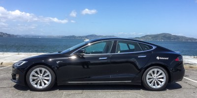 A Tesla with the Getaround logo. Photo: Getaround