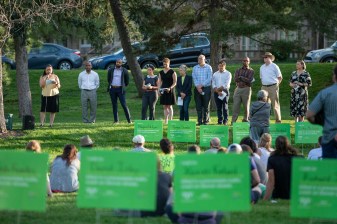Councilwoman Debbie Ortega slowly reads the people killed at an event to remember the 88 people drivers killed on Denver streets since 2018. Photo: Andy Bosselman