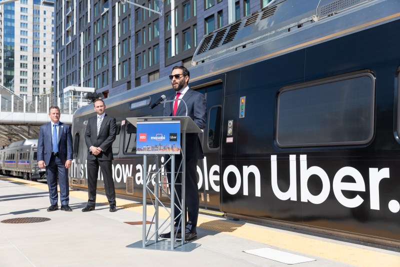 David Reich, Uber’s head of transit, discusses the company's partnership with RTD at Union Station Tuesday. Also pictured: RTD General Manager Dave Genova and Jonathan Donovan of Masabi, the company that makes RTD's mobile app. Photo: Andy Bosselman