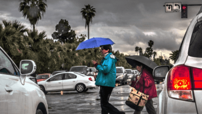 Man crossing in traffic